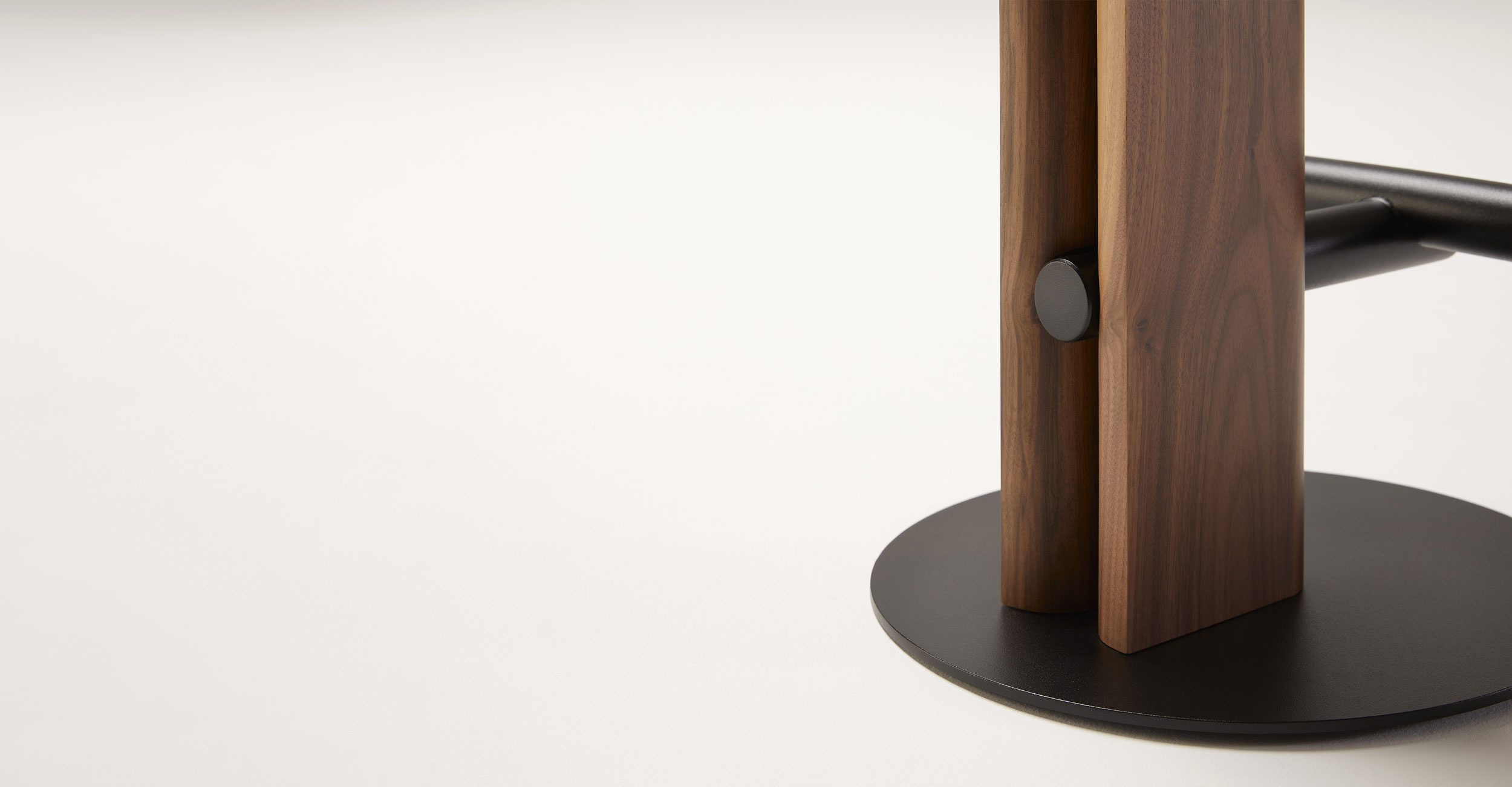 Detail view of Rook Stool in Natural Walnut finish